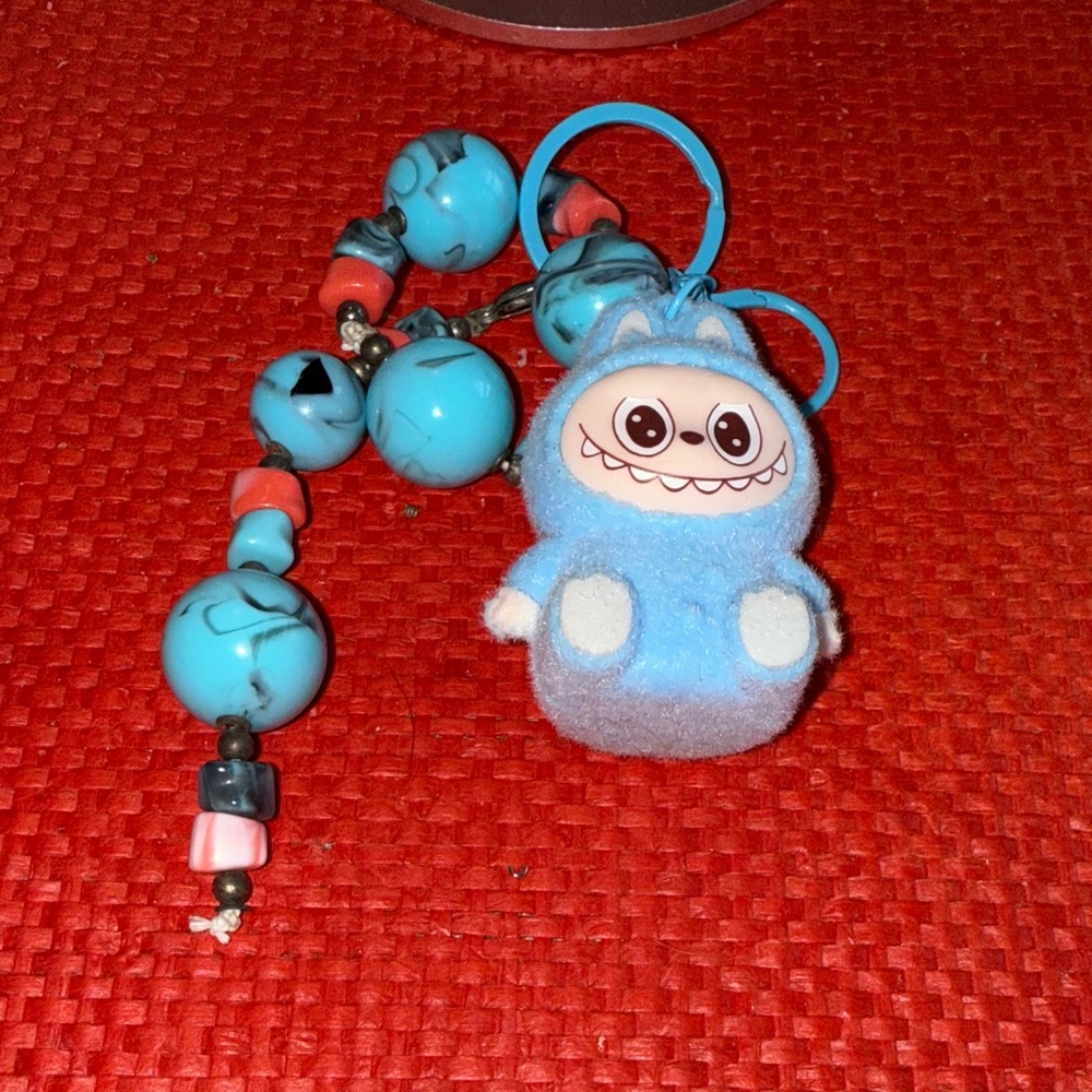 Blue Labubu purse key charm